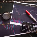black magnifying glass on black table